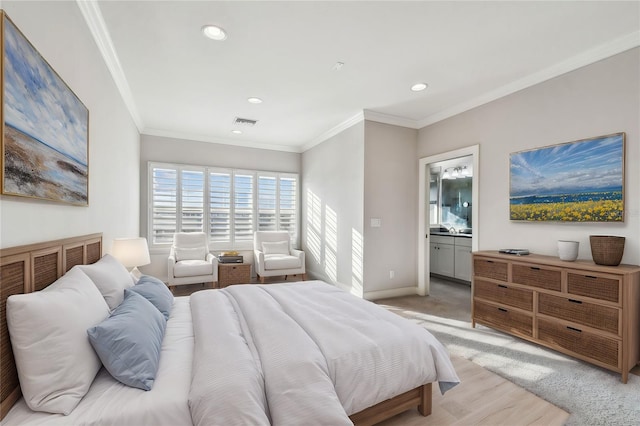 bedroom with light carpet, ensuite bath, and crown molding