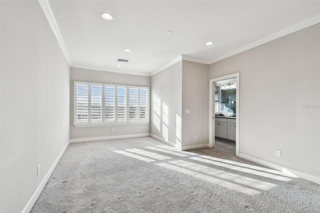 carpeted empty room with ornamental molding