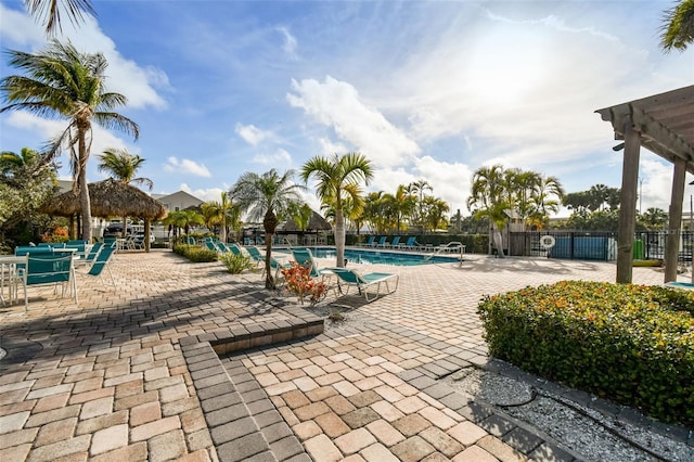 view of swimming pool featuring a patio, a pergola, and a gazebo