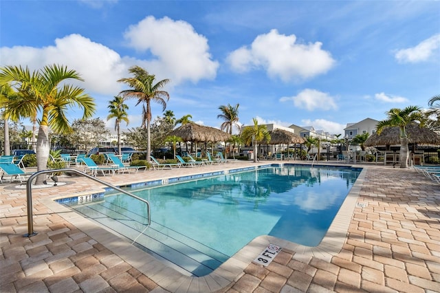 view of swimming pool featuring a patio and a gazebo