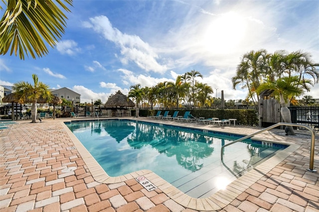 view of swimming pool featuring a patio and a gazebo