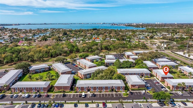 bird's eye view with a residential view and a water view