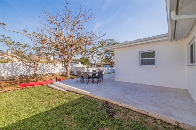 view of yard featuring a patio and a fenced backyard