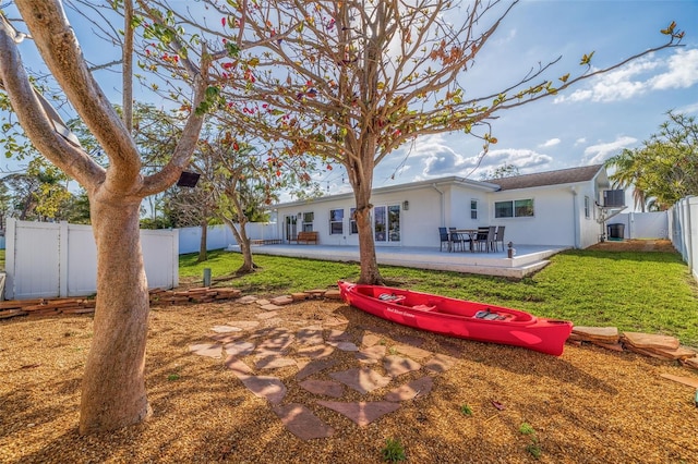 view of yard featuring a fenced backyard and a patio area