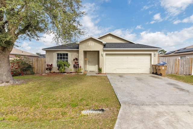 ranch-style house with a front yard and a garage