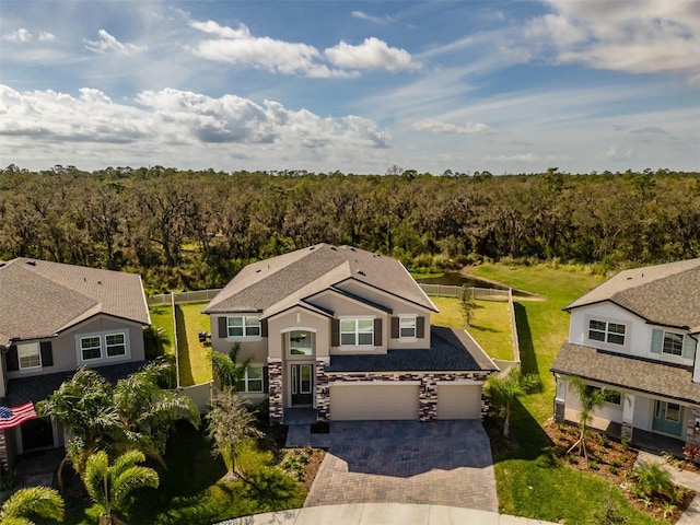 bird's eye view with a view of trees