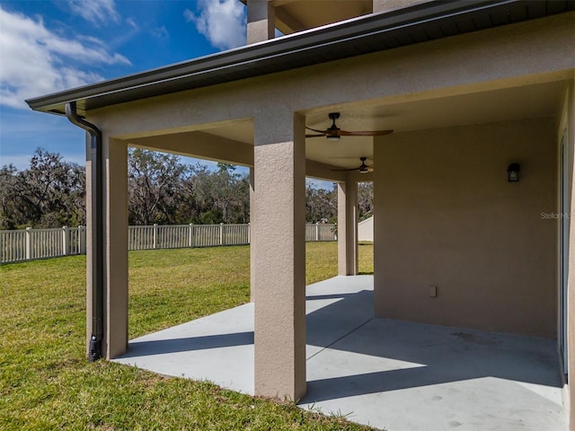view of patio featuring a fenced backyard and a ceiling fan