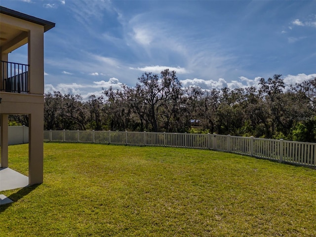 view of yard with a fenced backyard