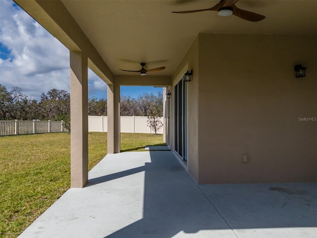 view of patio featuring ceiling fan and a fenced backyard