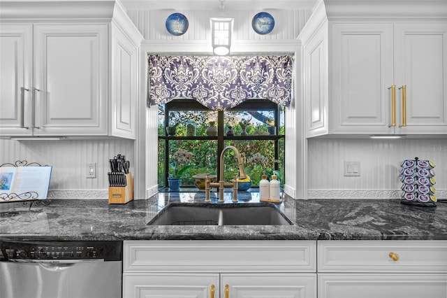 kitchen with a sink, white cabinetry, and dishwasher