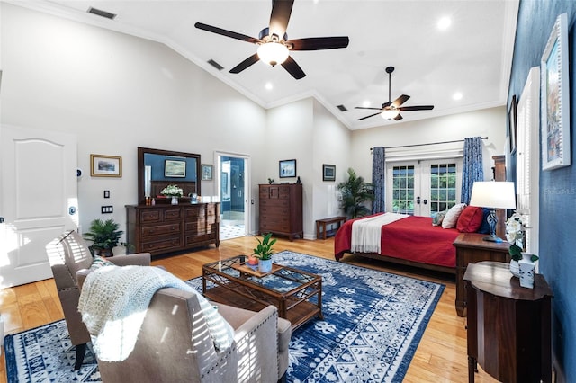 bedroom featuring french doors, visible vents, and light wood-style floors