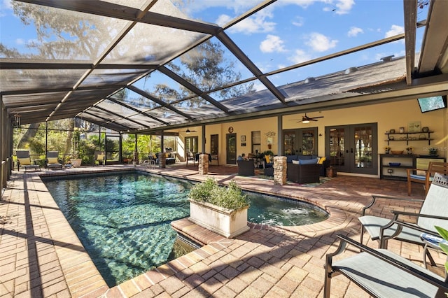 pool featuring ceiling fan, french doors, a patio, and an outdoor hangout area