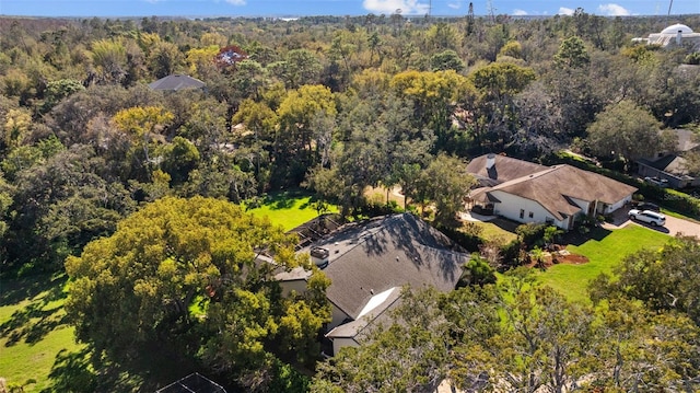 aerial view featuring a view of trees