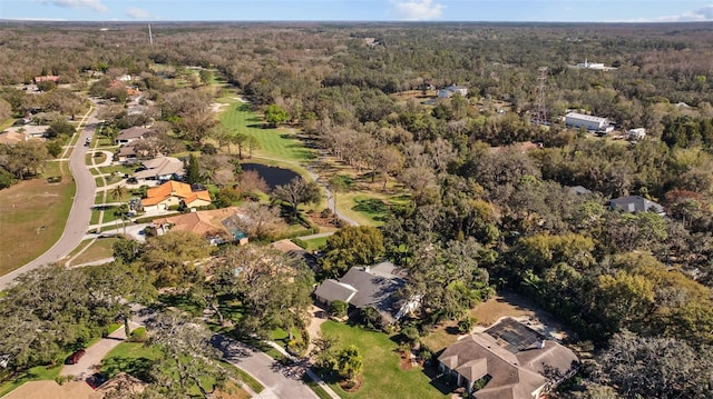 aerial view featuring a view of trees