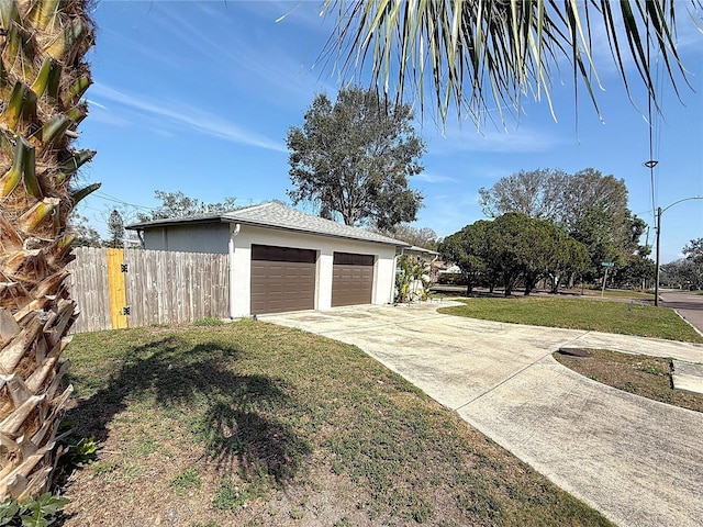 garage with a lawn