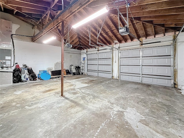 garage featuring a garage door opener