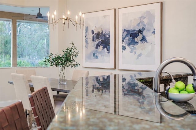 dining area featuring ceiling fan and plenty of natural light