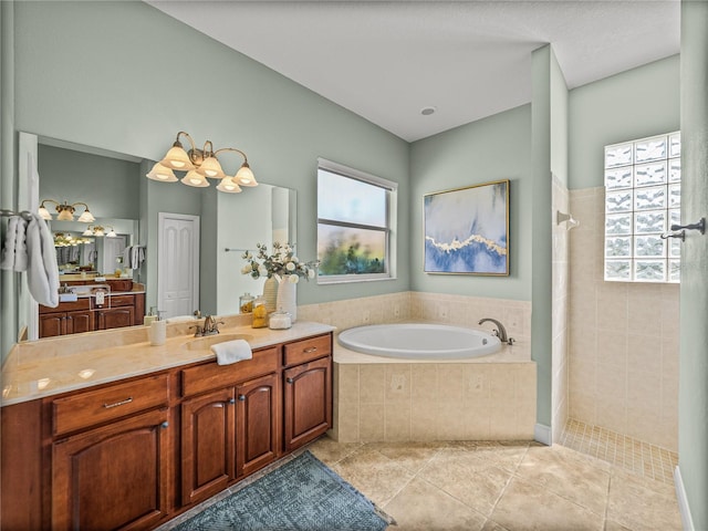 bathroom with tile patterned floors, vanity, and plus walk in shower