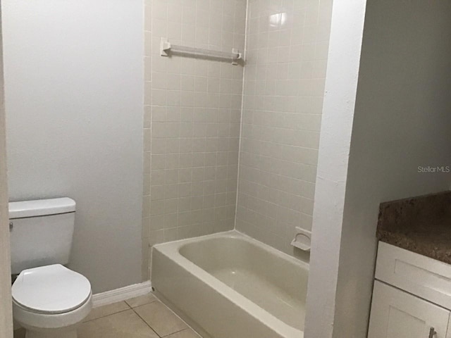 full bathroom featuring shower / washtub combination, tile patterned flooring, toilet, and baseboards