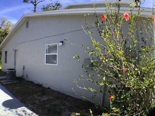 view of home's exterior with central air condition unit