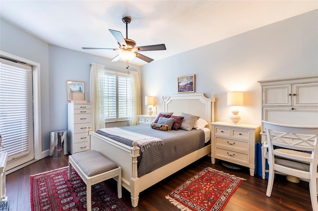 bedroom featuring dark wood-type flooring and a ceiling fan