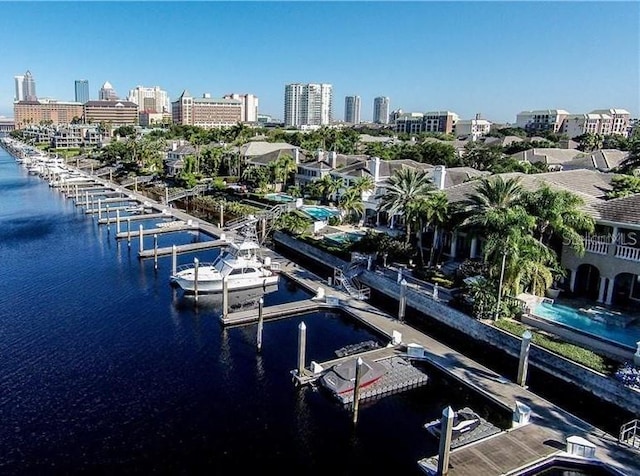 exterior space featuring a water view and a view of city