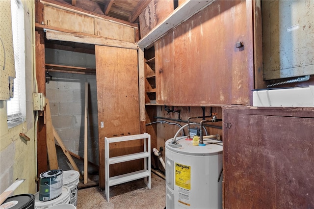 utility room featuring electric water heater