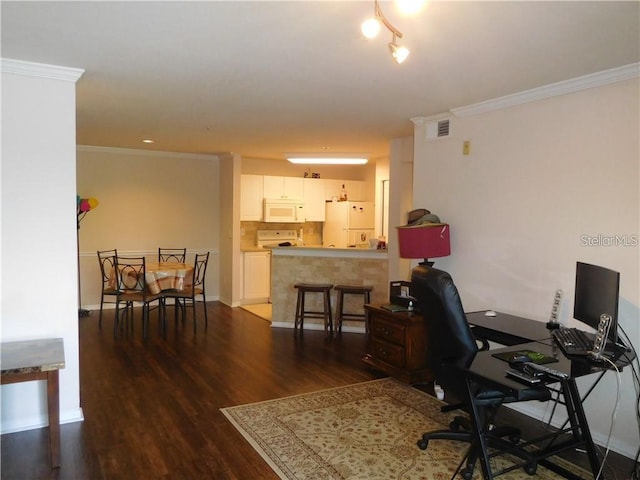 office space featuring dark wood-type flooring and crown molding