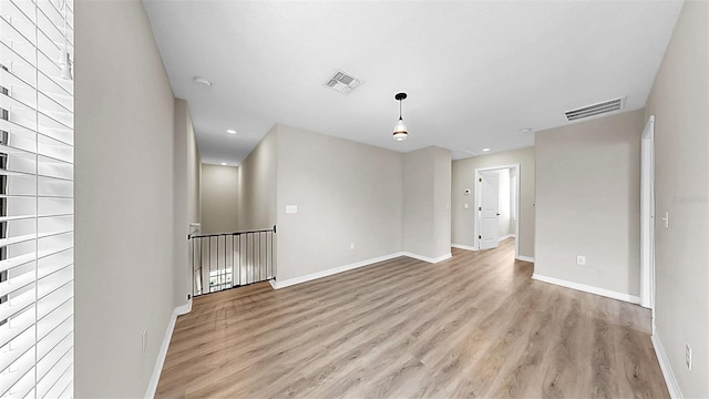 11201 Hudson Hills Ln, Riverview, FL 33579 - unfurnished room featuring light wood-style floors, baseboards, and recessed lighting