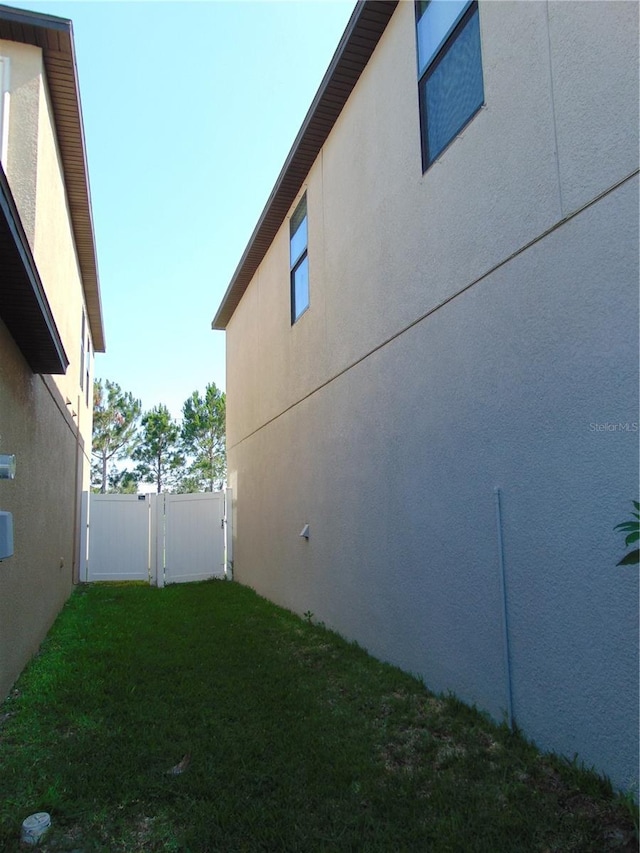 11201 Hudson Hills Ln, Riverview, FL 33579 - view of home's exterior with stucco siding