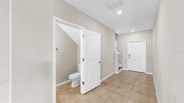 11201 Hudson Hills Ln, Riverview, FL 33579 - hallway featuring light tile patterned flooring, recessed lighting, stairway, and baseboards