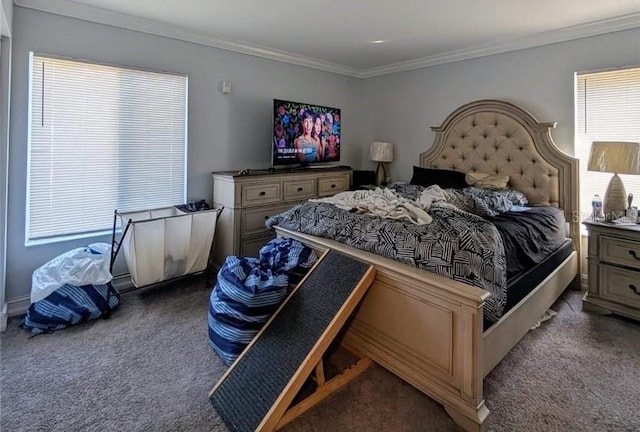 bedroom with dark carpet and ornamental molding