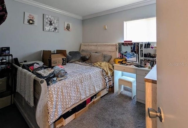 carpeted bedroom featuring crown molding