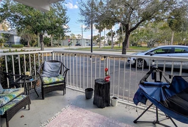 view of patio with a balcony