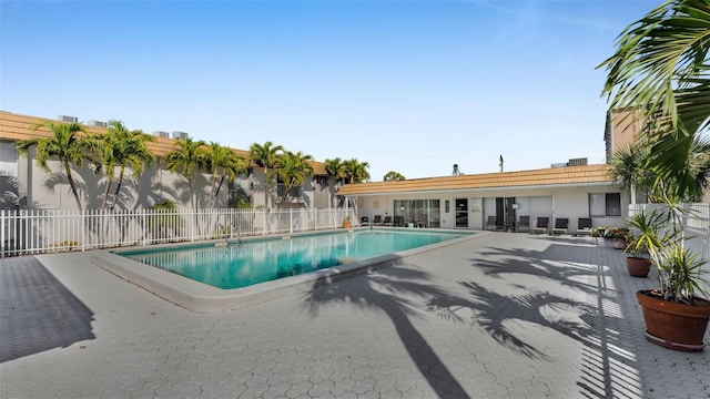 view of swimming pool featuring a patio