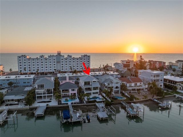 8505 Blind Pass Dr, Treasure Island, FL 33706 - aerial view at dusk of a water view