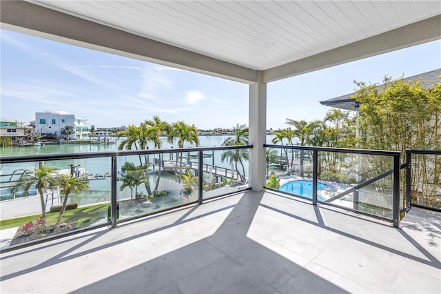 8505 Blind Pass Dr, Treasure Island, FL 33706 - balcony with a water view and view of pool area