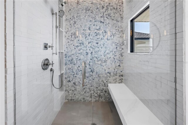 8505 Blind Pass Dr, Treasure Island, FL 33706 - bathroom featuring tiled shower