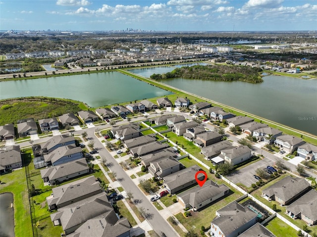 drone / aerial view with a water view