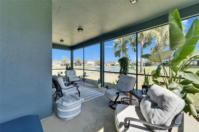 sunroom with a water view