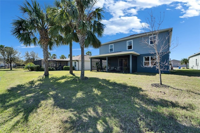 view of front of property with a sunroom and a front lawn