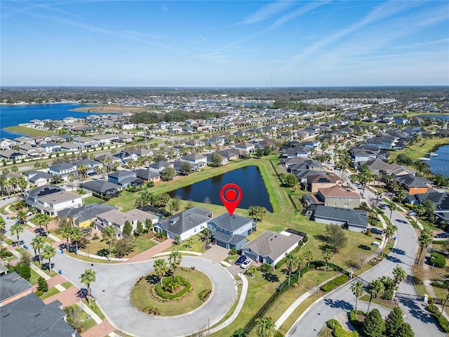 aerial view featuring a water view and a residential view