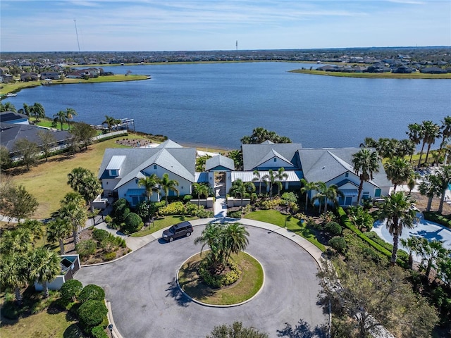 aerial view featuring a water view and a residential view