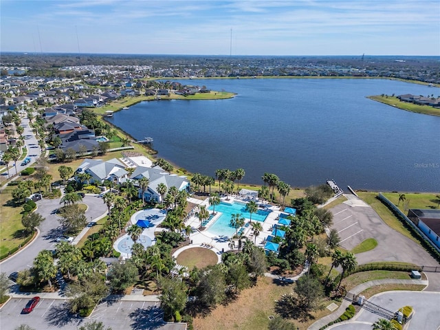 bird's eye view with a residential view and a water view