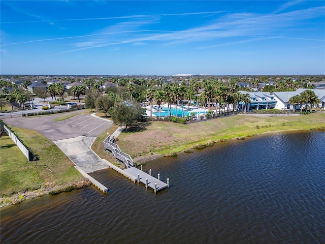 bird's eye view with a water view and a residential view