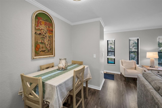 dining space featuring crown molding, dark hardwood / wood-style floors, and a textured ceiling