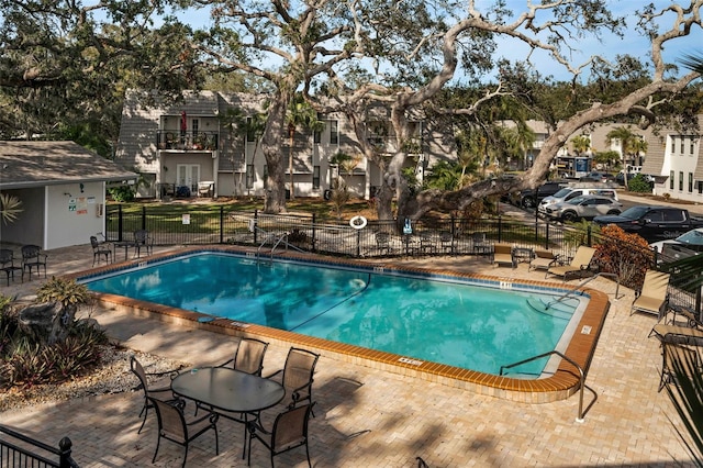 view of pool featuring a patio area