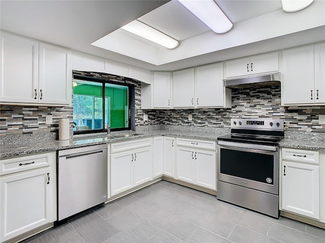 kitchen featuring appliances with stainless steel finishes, white cabinetry, and under cabinet range hood