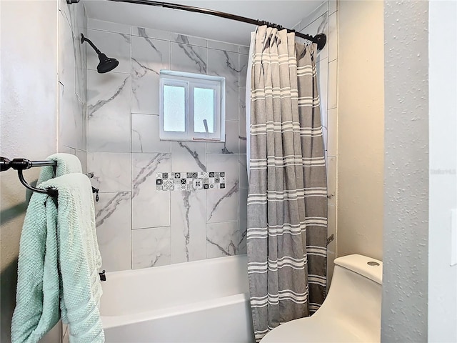 full bath with toilet and shower / tub combo