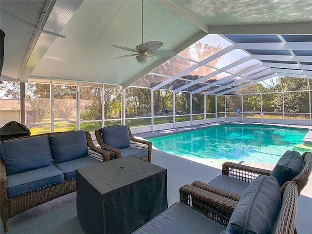 outdoor pool featuring an outdoor hangout area, a patio area, and a lanai